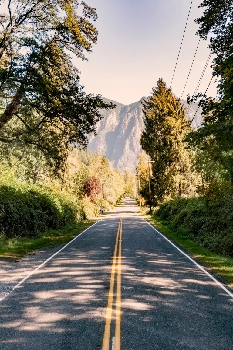 empty-country-road-leading-toward-the-mountains-wi-2025-01-09-07-52-37-utc (Medium)